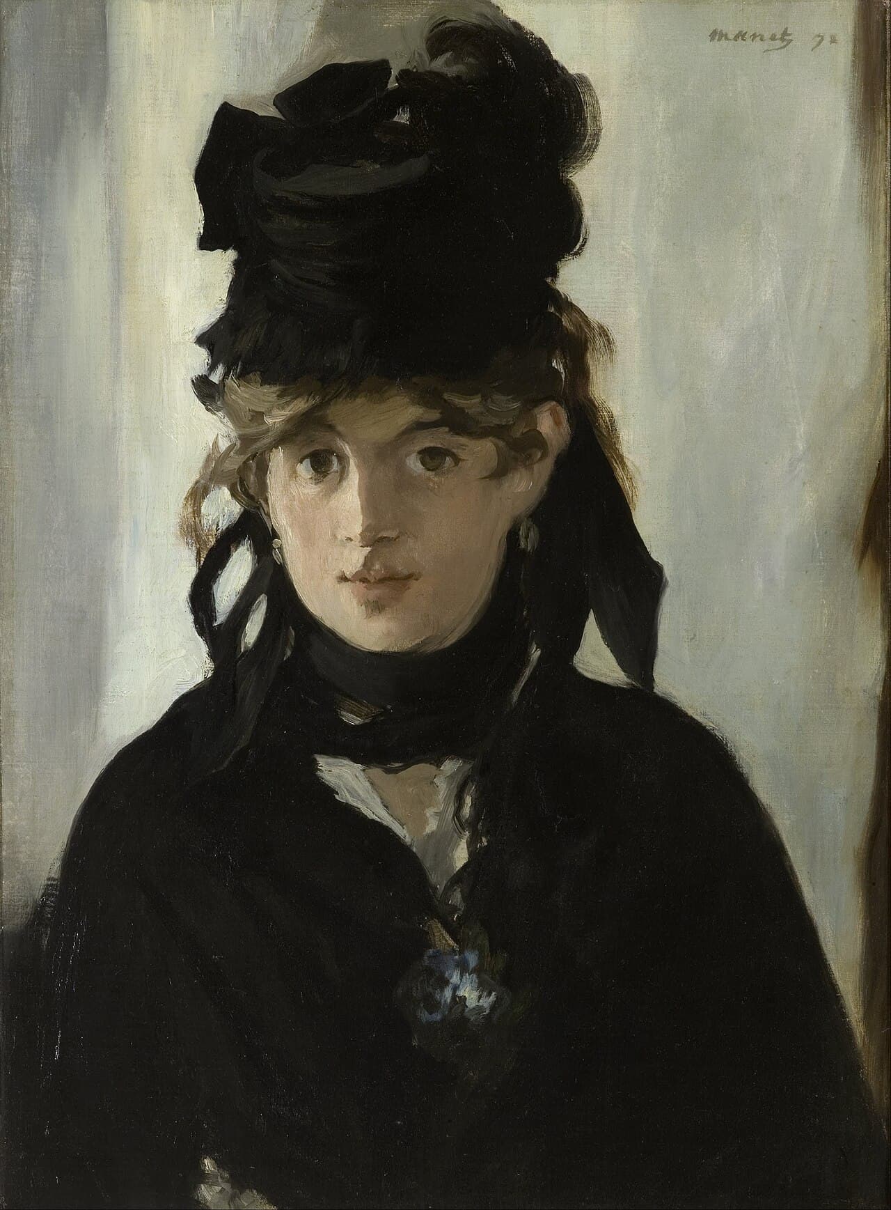 Berthe Morisot with a Bouquet of Violets by Édouard Manet (1872)