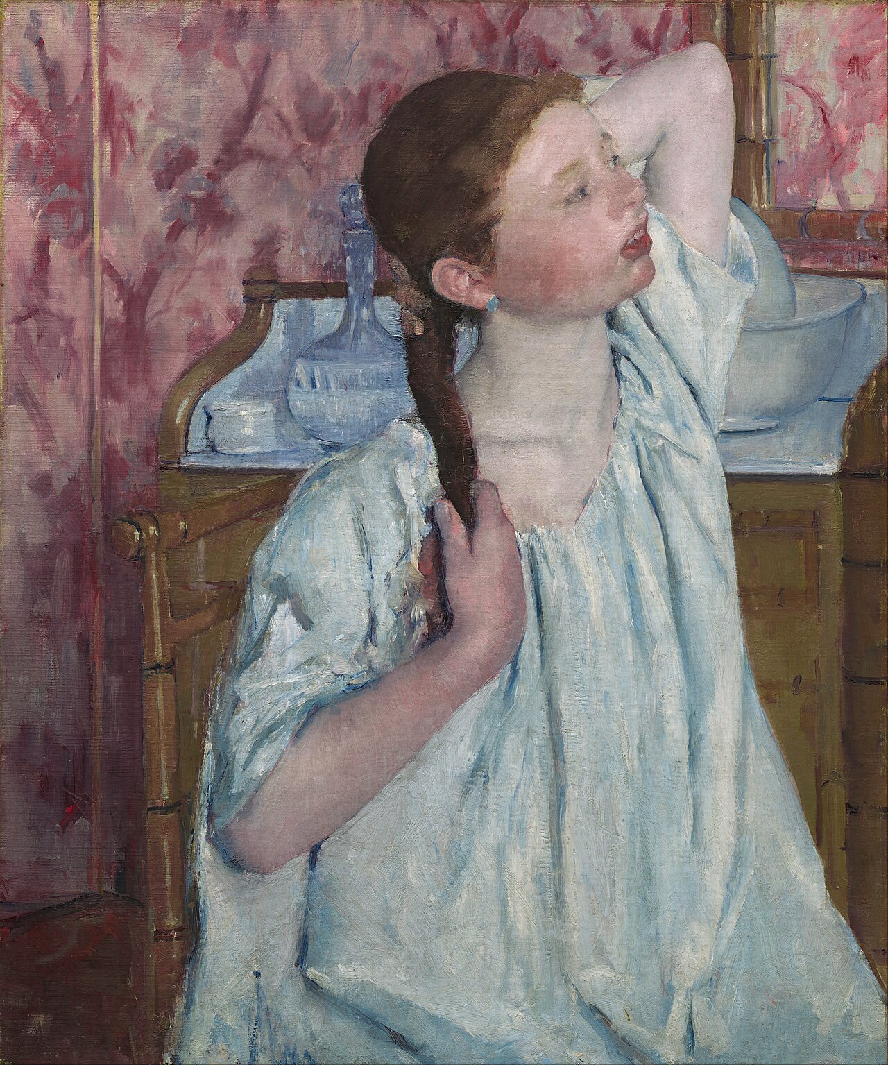 Girl Arranging Her Hair
